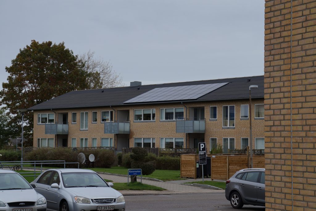 Two storey demo building with integrated solar PV panels towards West. Photo: DEM Danish Energy Management